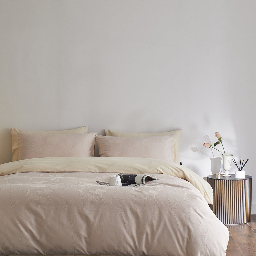 Reversible cotton percale bedding set with fine relief texture and additional pillowcases
