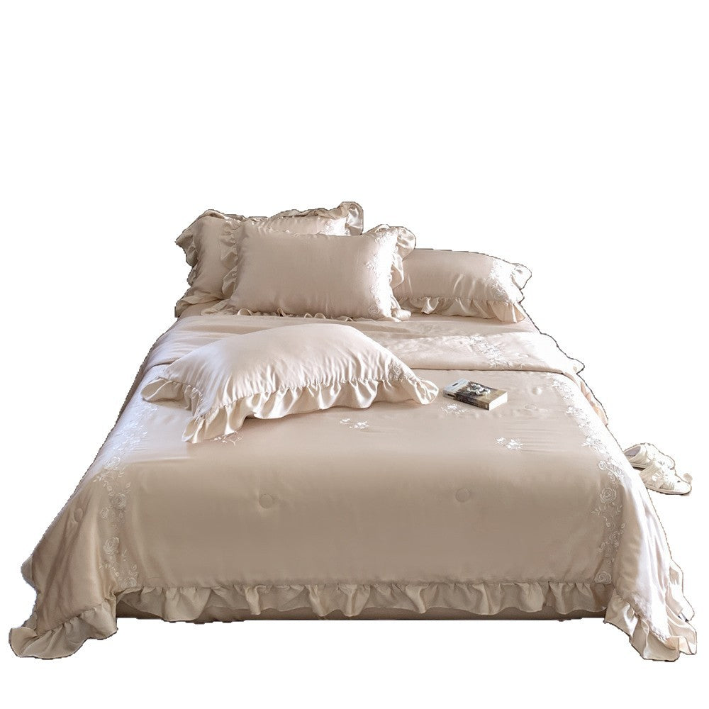 Satin bedding set with ruffled hem and fine rose embroidery