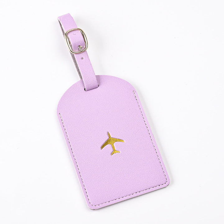premium leather luggage tag with adjustable buckle strap and embossed airplane Stornfield