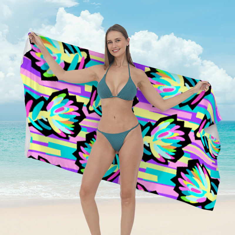 Beach towel with vibrant tropical plant motif Stornfield