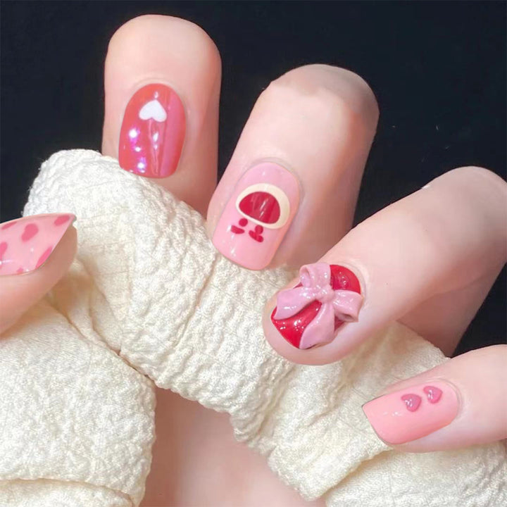 Artful nail extensions with an elegant leaf pattern Stornfield