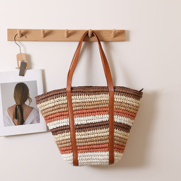 Braided straw tote bag with sturdy leather handles Stornfield