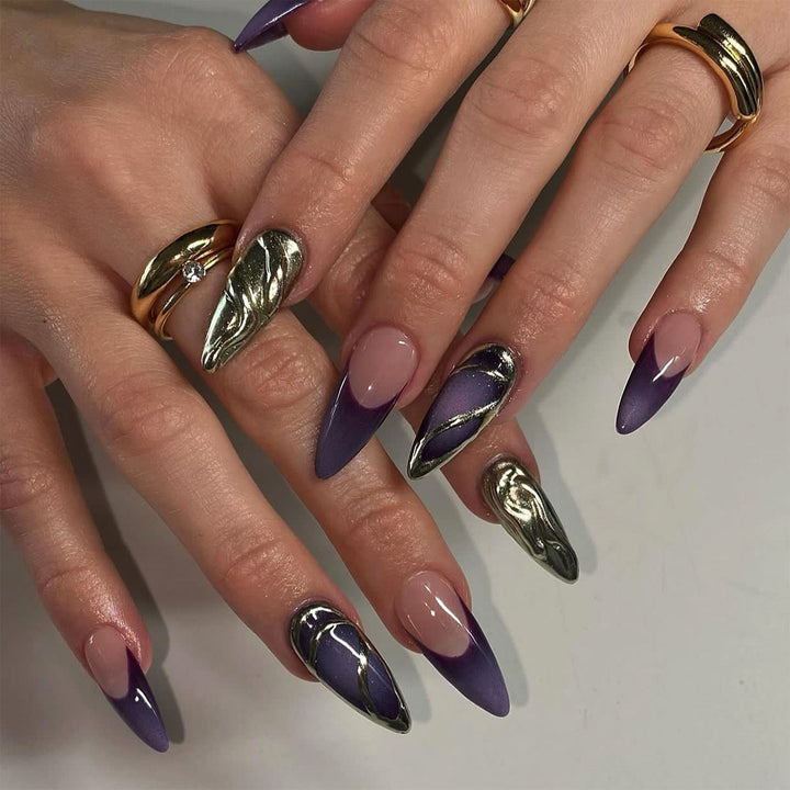 Artful stiletto nails with elegant gold and ombre design Stornfield