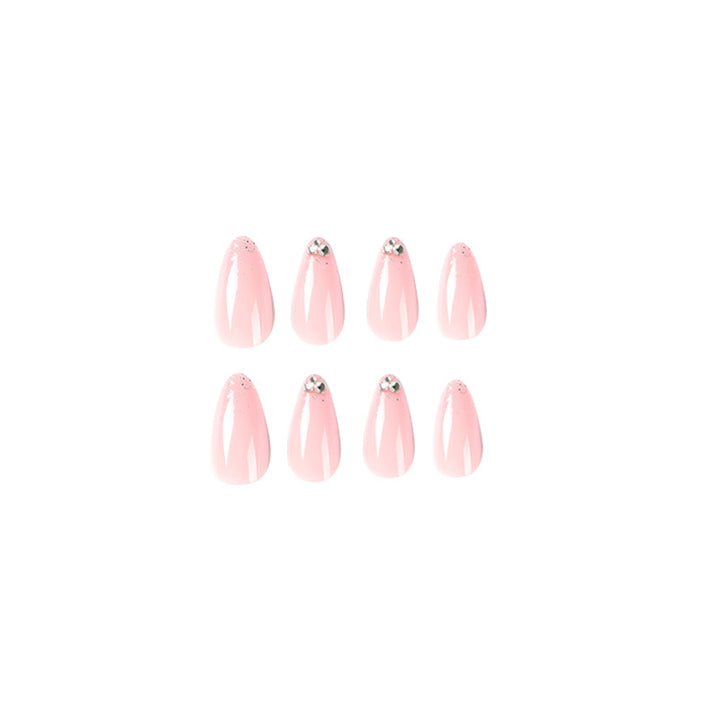 Elegant Nail Art with Glitter and Rhinestone Decorations Stornfield