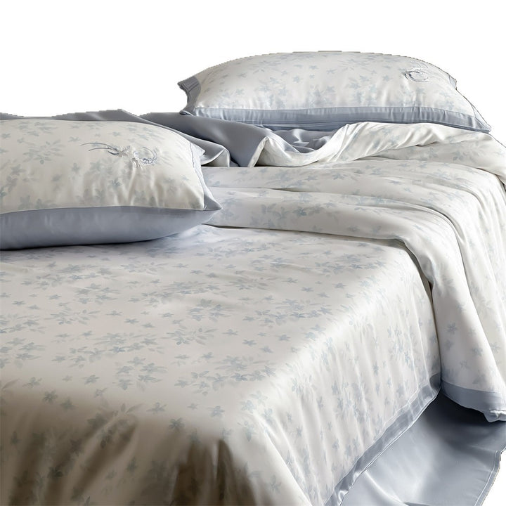 High-quality cotton satin bed set with delicate flower print and fine piping edge