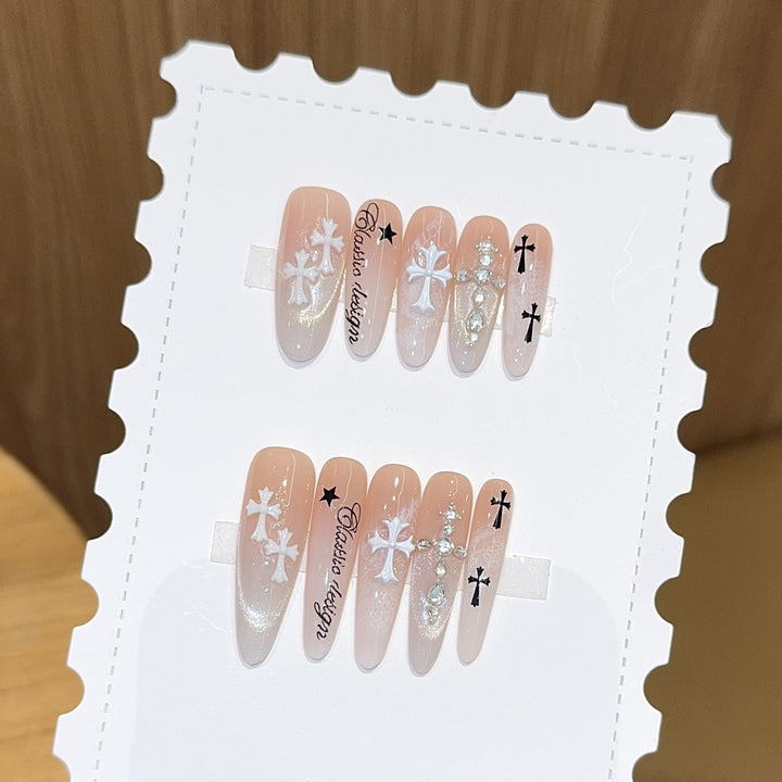 Artificial nail tips with cross and glitter motifs Stornfield
