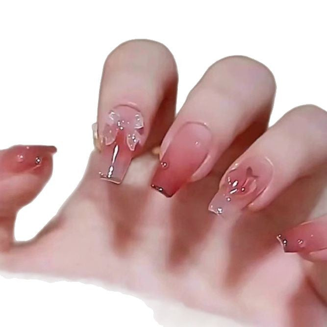 Elegant nail design with pearl embellishment Stornfield
