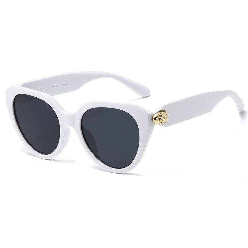 Ladies Cat-Eye Sunglasses with Golden Accents and Protective UV Filter Stornfield