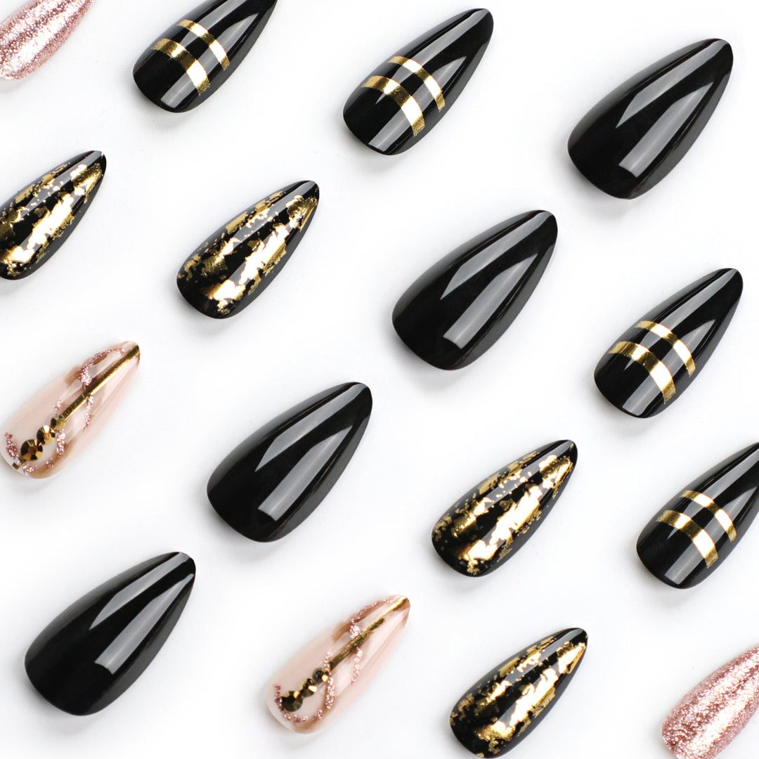 Glamorous stiletto nails with golden accents Stornfield