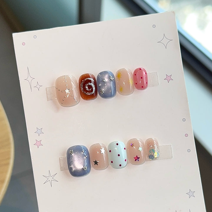 Creative artificial nails with sparkling star patterns Stornfield
