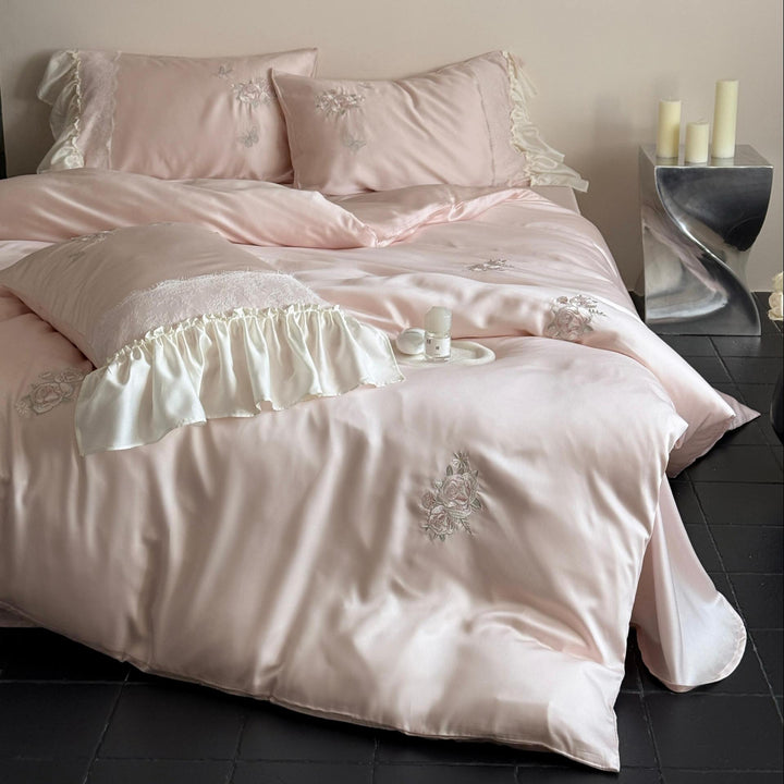 Luxurious satin bedding set with ruffles and embroidery Stornfield