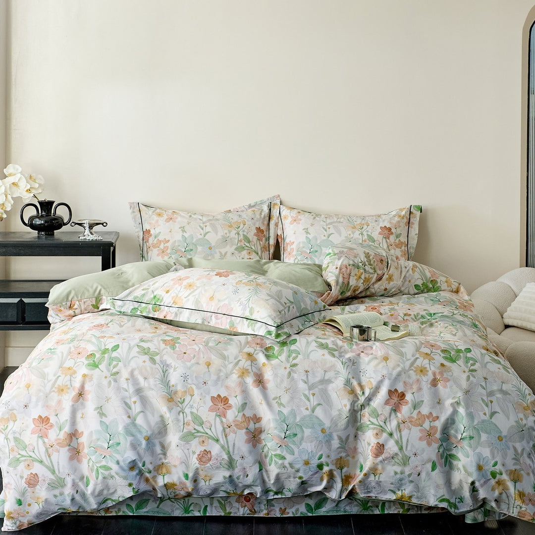 Reversible cotton satin bedding with delicate watercolor floral print and satin edge