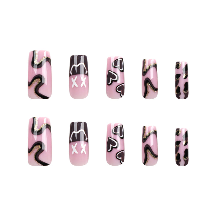 Artful nail extensions in elegant design with gold accents Stornfield