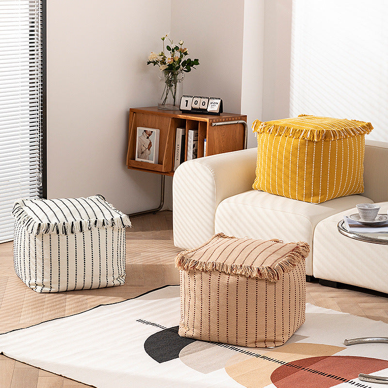 Boho seat pouf made of cotton fabric with fringes Stornfield