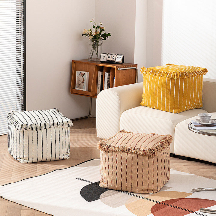 Boho seat pouf made of cotton fabric with fringes Stornfield