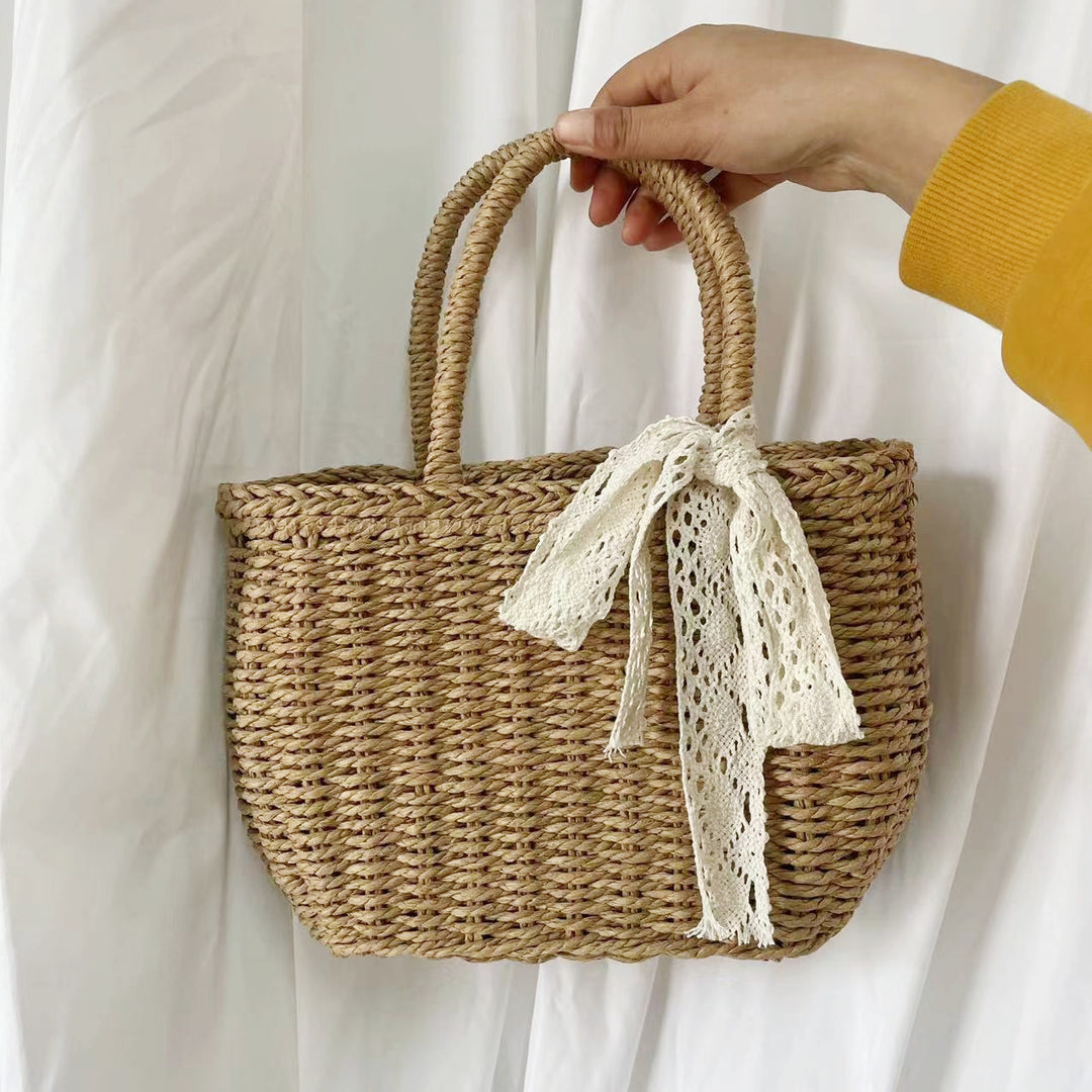 Handwoven basket bag with elegant bow Stornfield