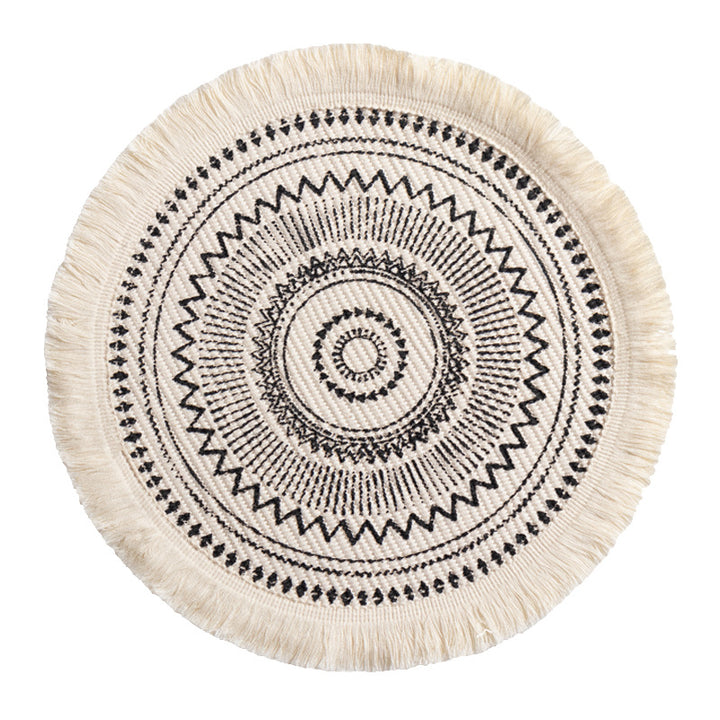 Round woven Boho rug mat with decorative fringes Stornfield