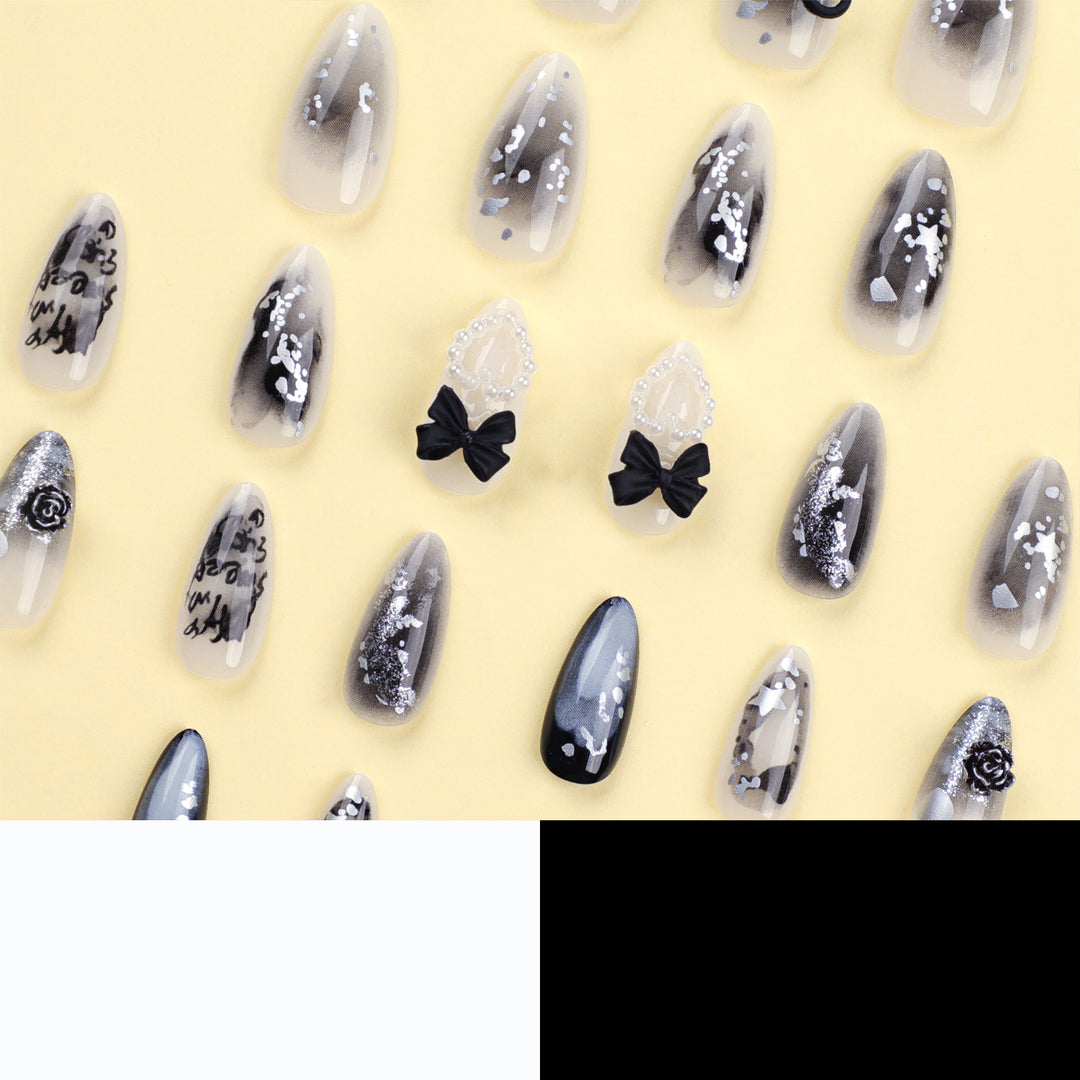 Artificial nail art with unique black and white design Stornfield