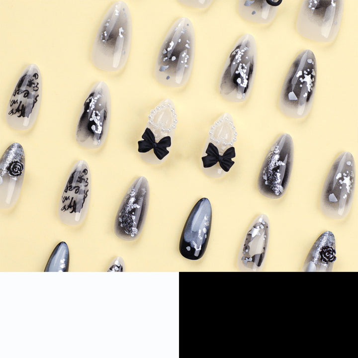 Artificial nail art with unique black and white design Stornfield