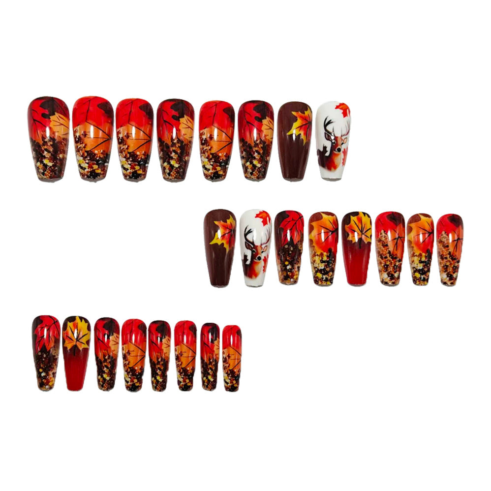Artificial nail art with autumn leaf design Stornfield