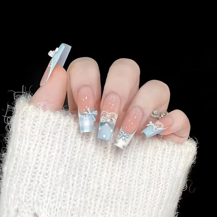 Elegant artificial nails with bow design Stornfield