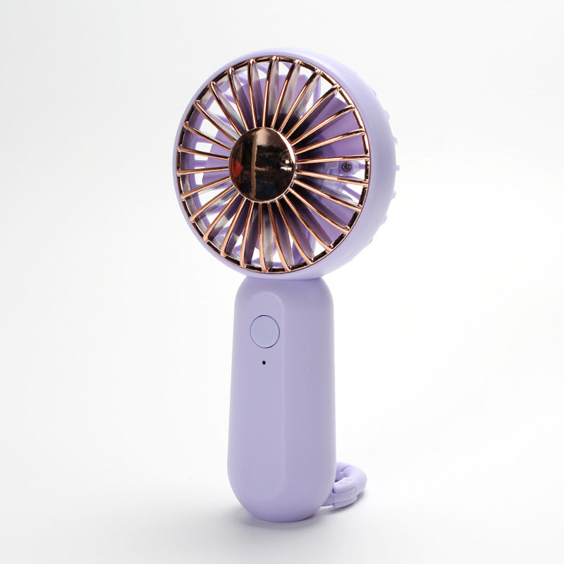 Unisex portable mini hand fan with USB charging and carrying strap Stornfield