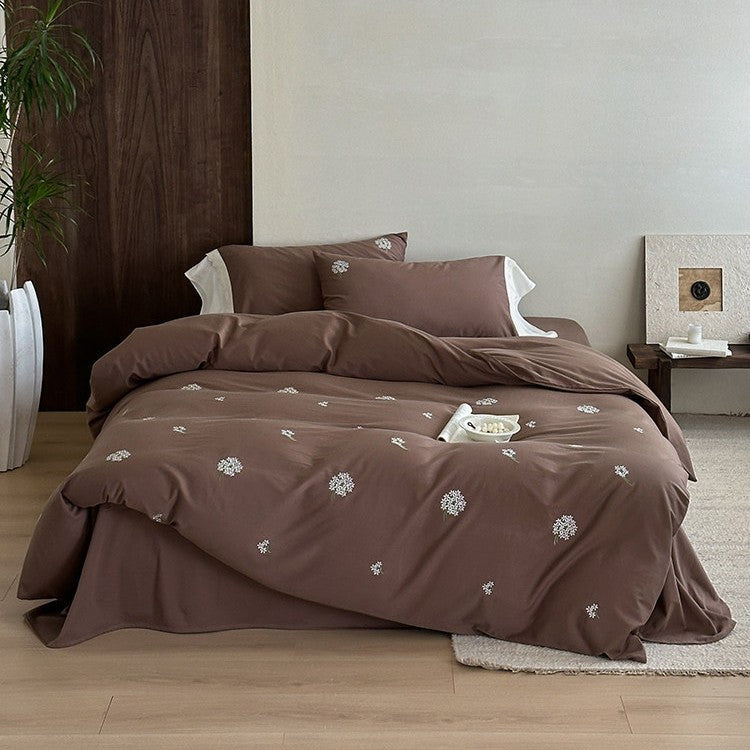 Embroidered bed linen set made of cotton satin with subtle scattered flower embroidery