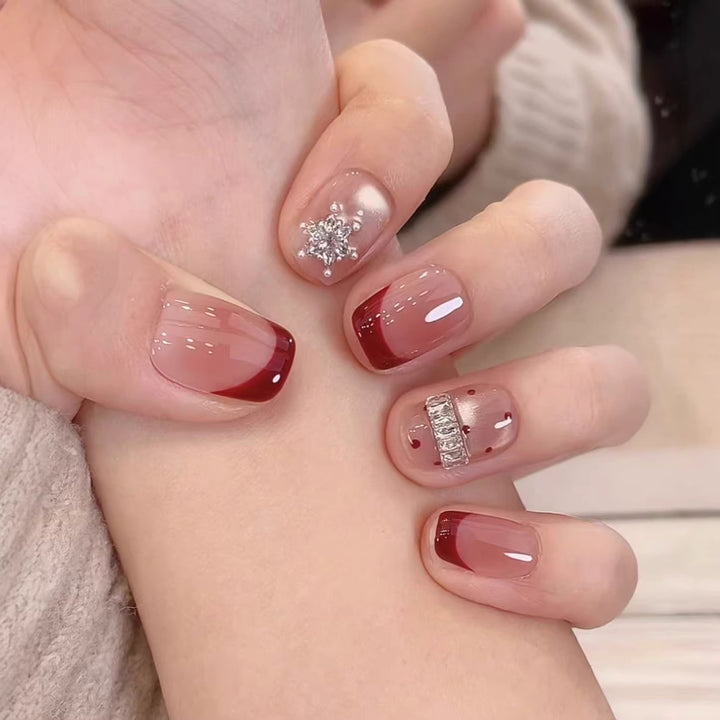 Elegant Rhinestone-Embellished Nail Art Stornfield