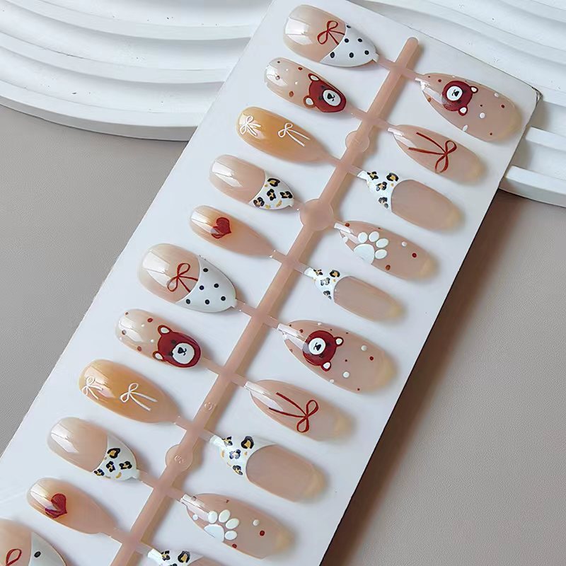 Artificial nails with animal and flower motifs Stornfield