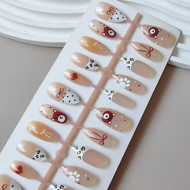 Artificial nails with animal and flower motifs Stornfield