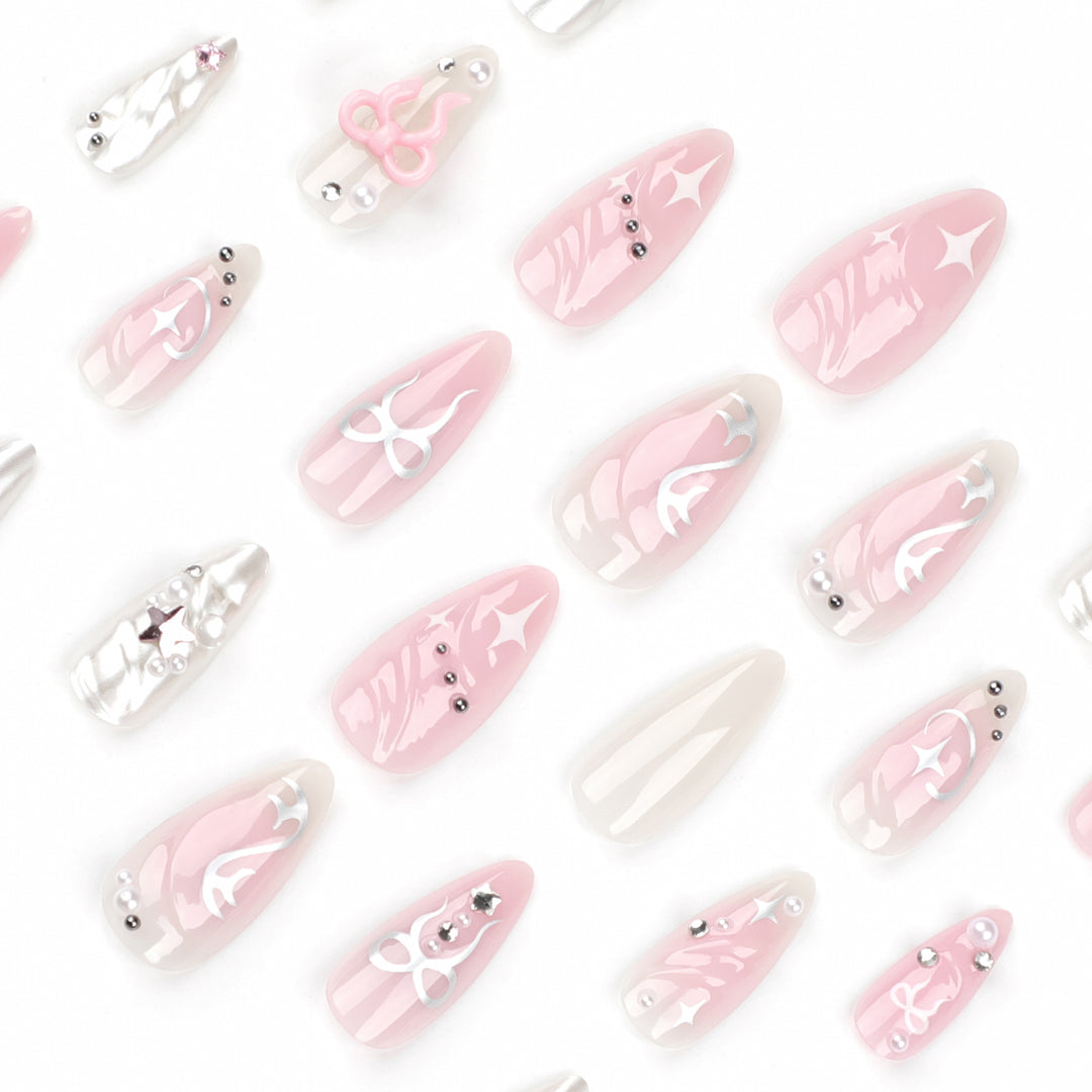 Artful stiletto nails in an elegant design with creative embellishments Stornfield