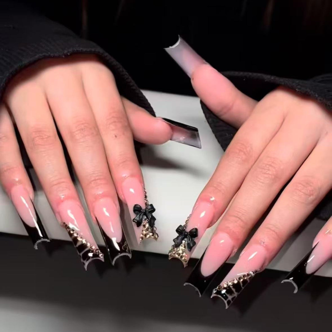 Artificial nail set with elegant tips and glamorous accents Stornfield