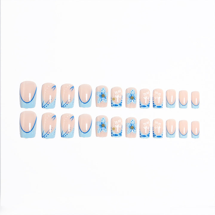 Acrylic nail set with exquisite floral and glitter accents Stornfield