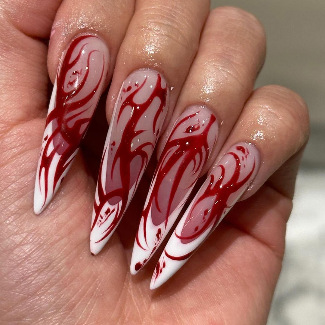 Creative Stiletto Nail Art with Blood Red Accents Stornfield