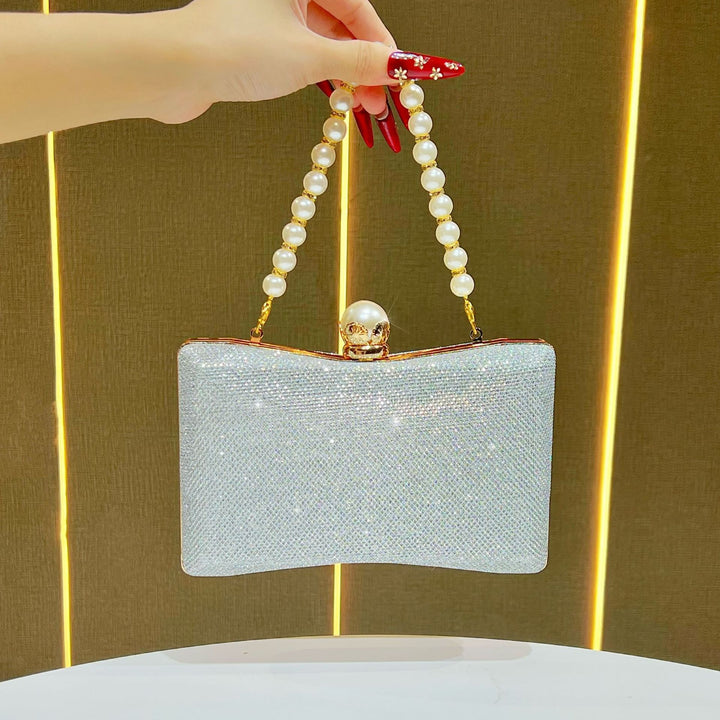 rhinestone-embellished evening clutch