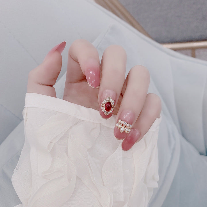Artful nail extensions with an elegant leaf pattern Stornfield