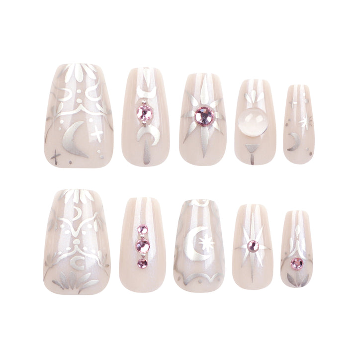 Artificial nail art with elegant rhinestone and glitter effects Stornfield