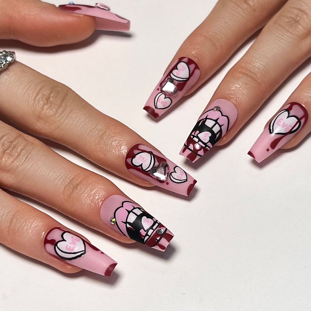 Artful stiletto nails with hearts and glitter accents Stornfield