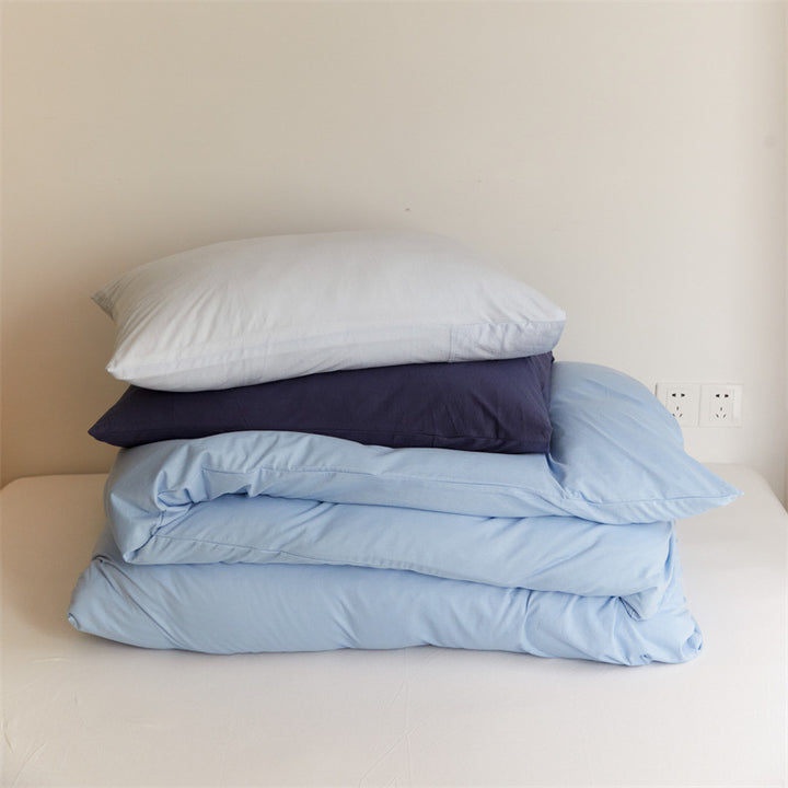 Bedding set made of cotton percale with striped pillowcase and smooth duvet cover