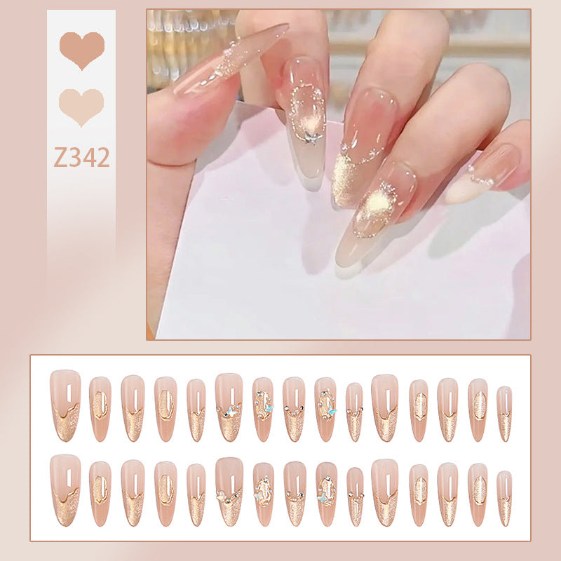 Art nail set with elegant gold glitter design Stornfield