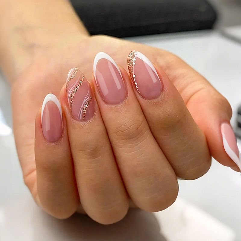 Artificial nails with elegant French tips and glittering accents Stornfield