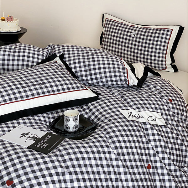 Bedding set in Vichy check with contrasting satin trim