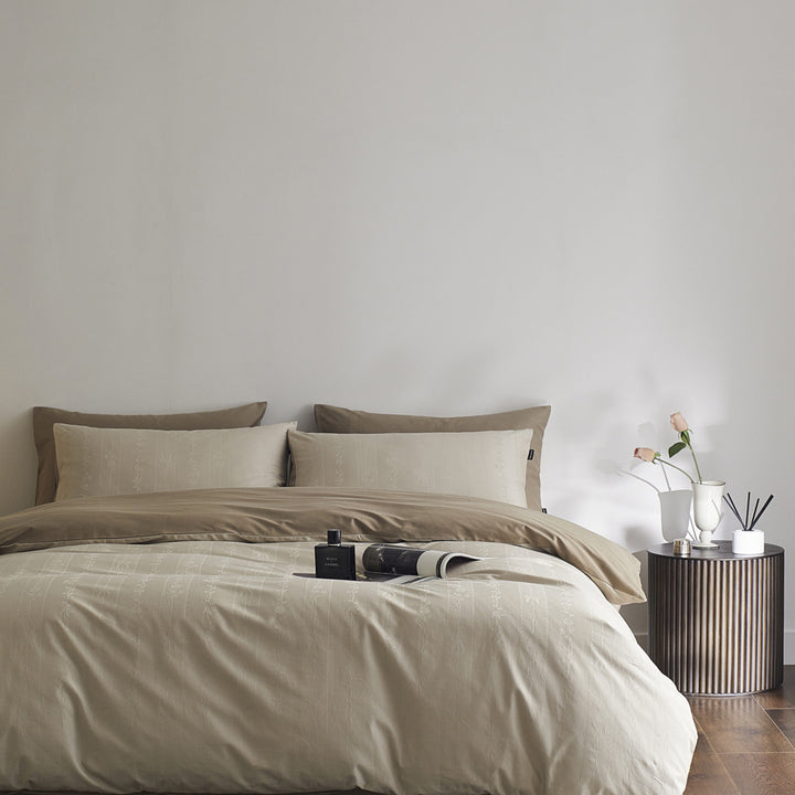 Reversible cotton percale bedding set with fine relief texture and additional pillowcases