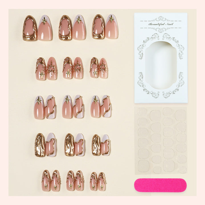 Acrylic nail set with luxurious gold accents and elegant designs Stornfield