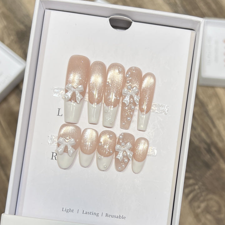 Decorative Long Press-On Nail Set with Bow and Pearl Accents Stornfield