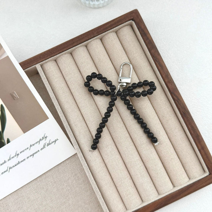 Elegant Pearl Bow Keychain Stornfield
