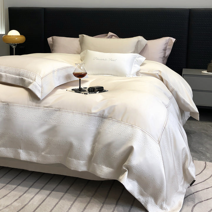 Premium cotton satin bedding set with structured matelassé border and hotel closure