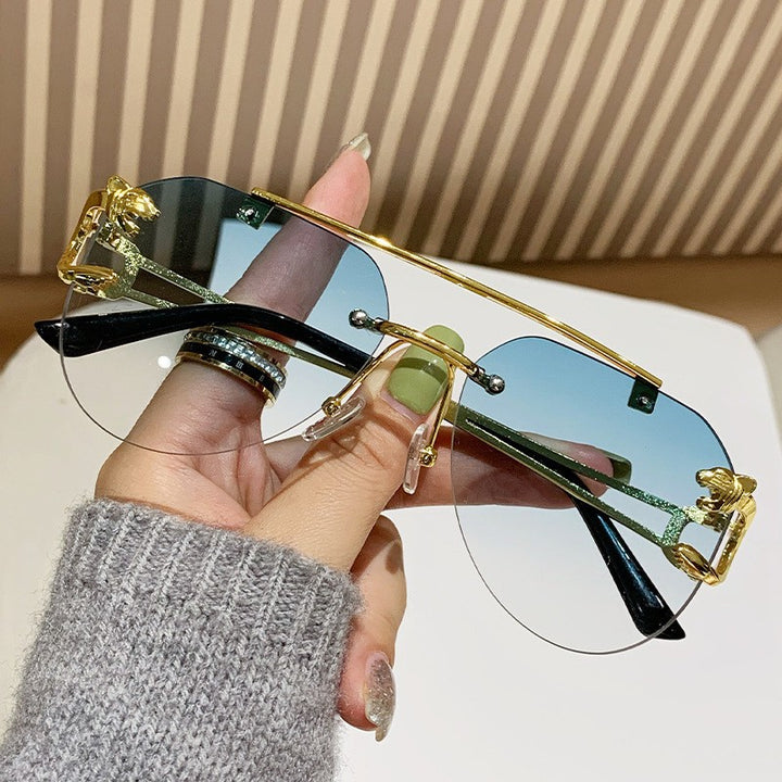 Women Designer Sunglasses with Unique Animal Accent Stornfield