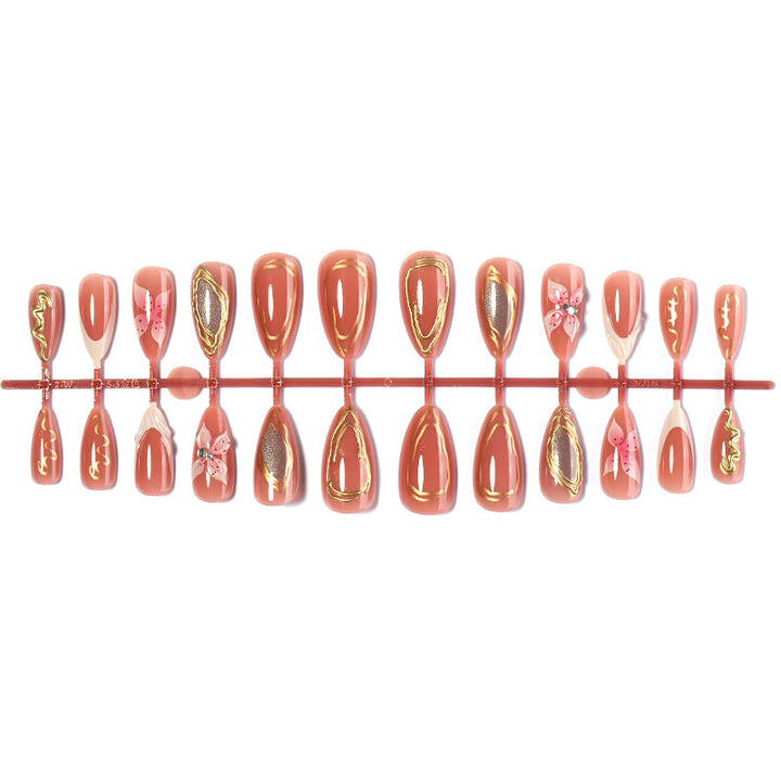Artificial nail set with elegant blooming designs and golden accents Stornfield