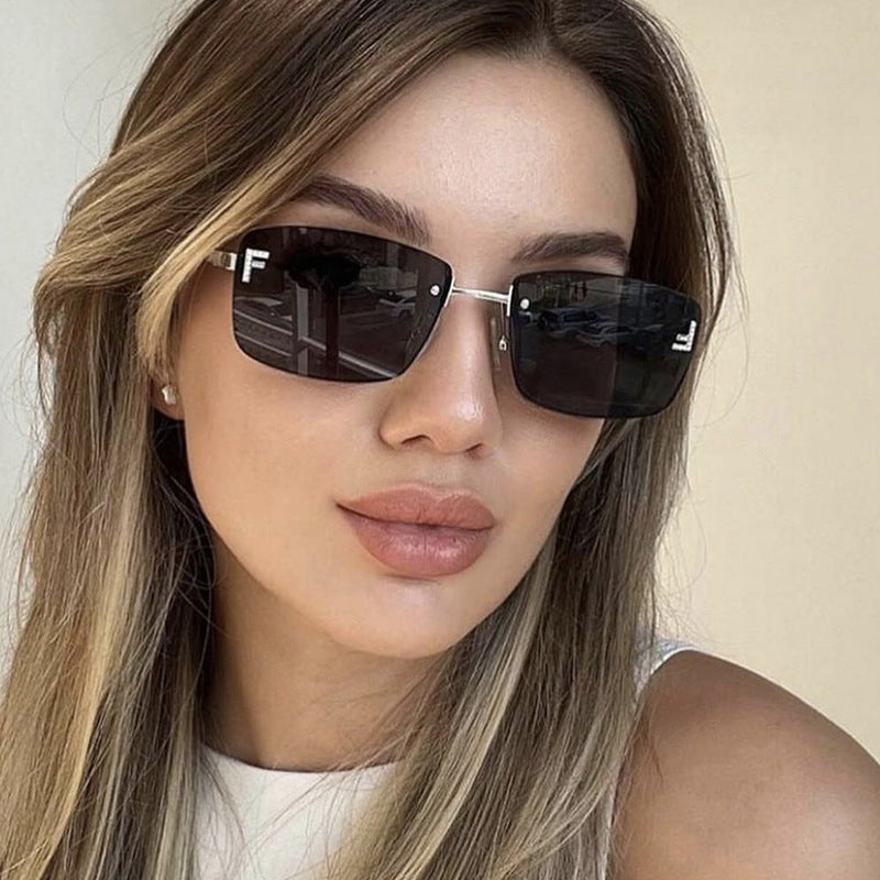 Ladies square sunglasses with elegant golden frame and stylish lenses Stornfield